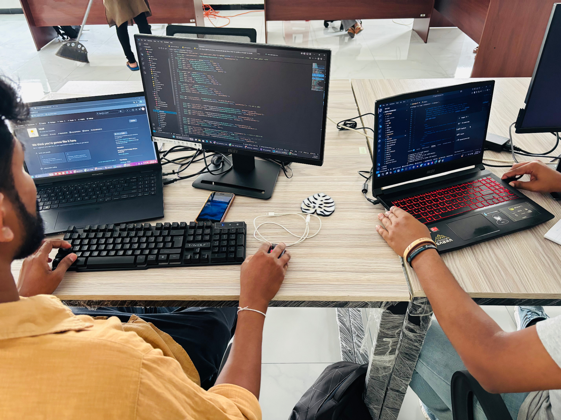 Idea8 software engineers pair-programming in the Colombo office