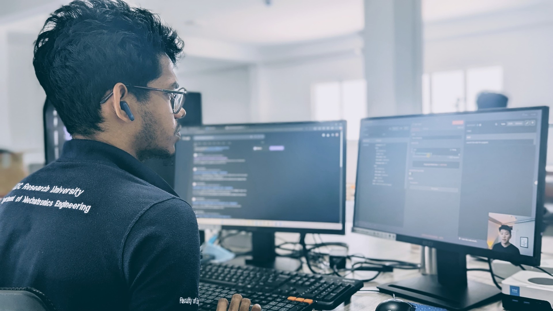 Mechatronics engineer working on IntelliFactory interfaces
